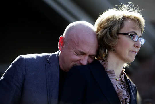 Former U.S. Rep. Gabby Giffords – here in 2013 with her husband, former astronaut and current Senate candidate Mark Kelly – was shot and severely injured while campaigning in 2011. 
