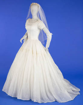 classic 1950s-era gown (why do brides wear white)