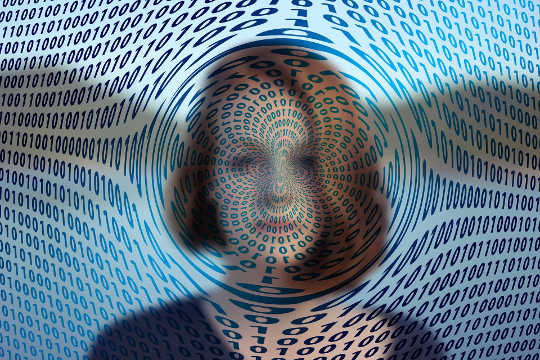 a woman's face in a spiral of data