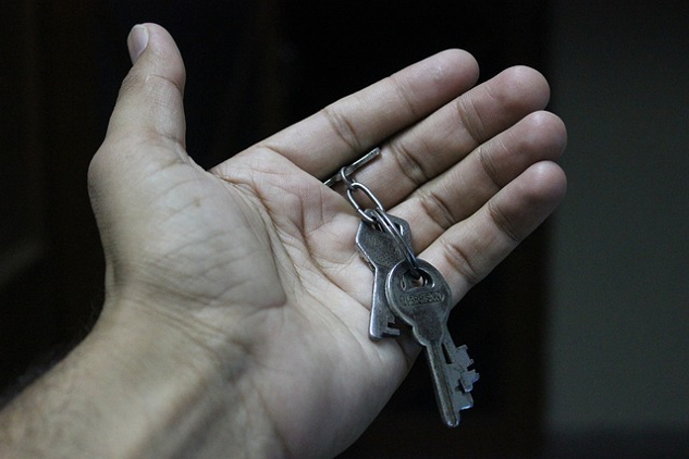 keys on a chain in an open hand