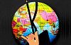 a hand holding a conductor's baton overlaid over the globe showing the countries