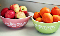 bowls of apples & oranges on counter	      Share This Article     facebook     twitter     Action  Beyond the usual advice about less food and more exercise, the study suggests that consciously replacing unhealthy cues with healthy ones in the home could have a real impact on a person's BMI, especially for women. (Credit: Abi Porter/Flickr) How the kitchen counter can predict your weight  Cornell University rightOriginal Study  Posted by George Lowery-Cornell on October 20, 2015  You are free to share this article under the Attribution 4.0 International license.  The types of ready-to-eat foods on a kitchen countertop could also hint at the weight of the people in the home, particularly women.  The study looked at photographs of more than 200 kitchens in Syracuse, New York, to test how the food environment relates to the body mass index (BMI) of the adults at home.  The women in the study who kept fresh fruit out in the open tended to be a normal weight compared with their peers. But when snacks like cereals and sodas were readily accessible, those people were heavier than their neighbors—by an average of more than 20 pounds.  “It’s your basic See-Food Diet—you eat what you see,” says Brian Wansink, professor and director of the Cornell Food and Brand Lab and lead author of the paper in the journal Health Education and Behavior. [Would you take food advice from a heavier blogger?]  The study finds that women who kept soft drinks on their counter weighed 24 to 26 pounds more than those who kept their kitchen clear of them. A box of cereal on the counter lined up with women there weighing an average 20 pounds more than their neighbors who didn’t.  “As a cereal-lover, that shocked me,” says Wansink. “Cereal has a health-halo, but if you eat a handful every time you walk by, it’s not going to make you skinny.”  When unhealthy foods are the most visible options in the kitchen, falling into habits that lead to weight gain becomes easier. Keeping those foods out of sight by sequestering them in pantries and cupboards reduces their convenience, making it less likely that they will be grabbed in a moment of hunger.  Clearing the counters of the cereals, sodas, and other snack items and replacing them with healthier visible cues like fresh fruit could help, the study finds: Women who had a fruit bowl visible weighed about 13 pounds less than neighbors who didn’t. [Could a bribe entice you to eat less?]  The study also finds that normal-weight women were more likely to have a designated cupboard for snack items and less likely to buy food in large-sized packages than those who are obese.  The findings provide new insights into the role environmental factors play with obesity and offer remedies to rid the home of unhealthy cues while promoting the healthy ones. Rather than just the usual dietary advice prescribing less food and more exercise, the study suggests that consciously replacing unhealthy cues with healthy ones in the home could have a real impact on a person’s BMI, especially for women.  “We’ve got a saying in our lab, ‘If you want to be skinny, do what skinny people do,'” Wansink says.  Source: Matt Hayes for Cornell University