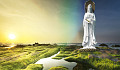 a statue of Guanyin, the goddes of compassion, outside in the marshes